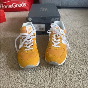 New Balance women’s mustard yellow and White 574